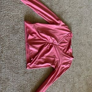 Ruffled pink long sleeved crop top